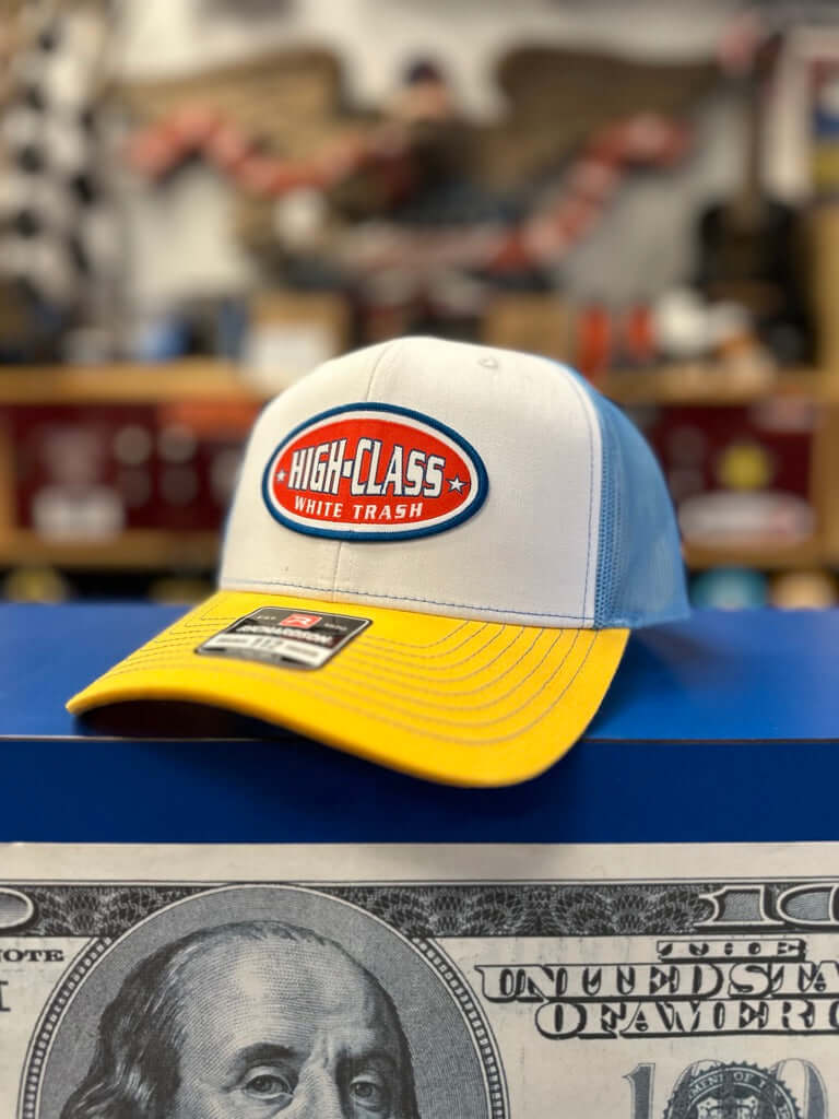 HCWT OG Oval Patched Snap Back Trucker Cap Col.Blue, White, Yellow - View 01