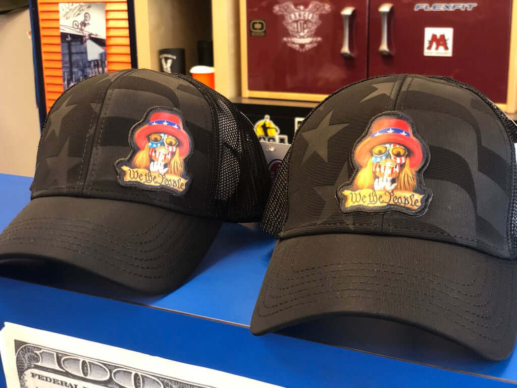 WE THE PEOPLE Trucker Hat (Black Flag Pattern)